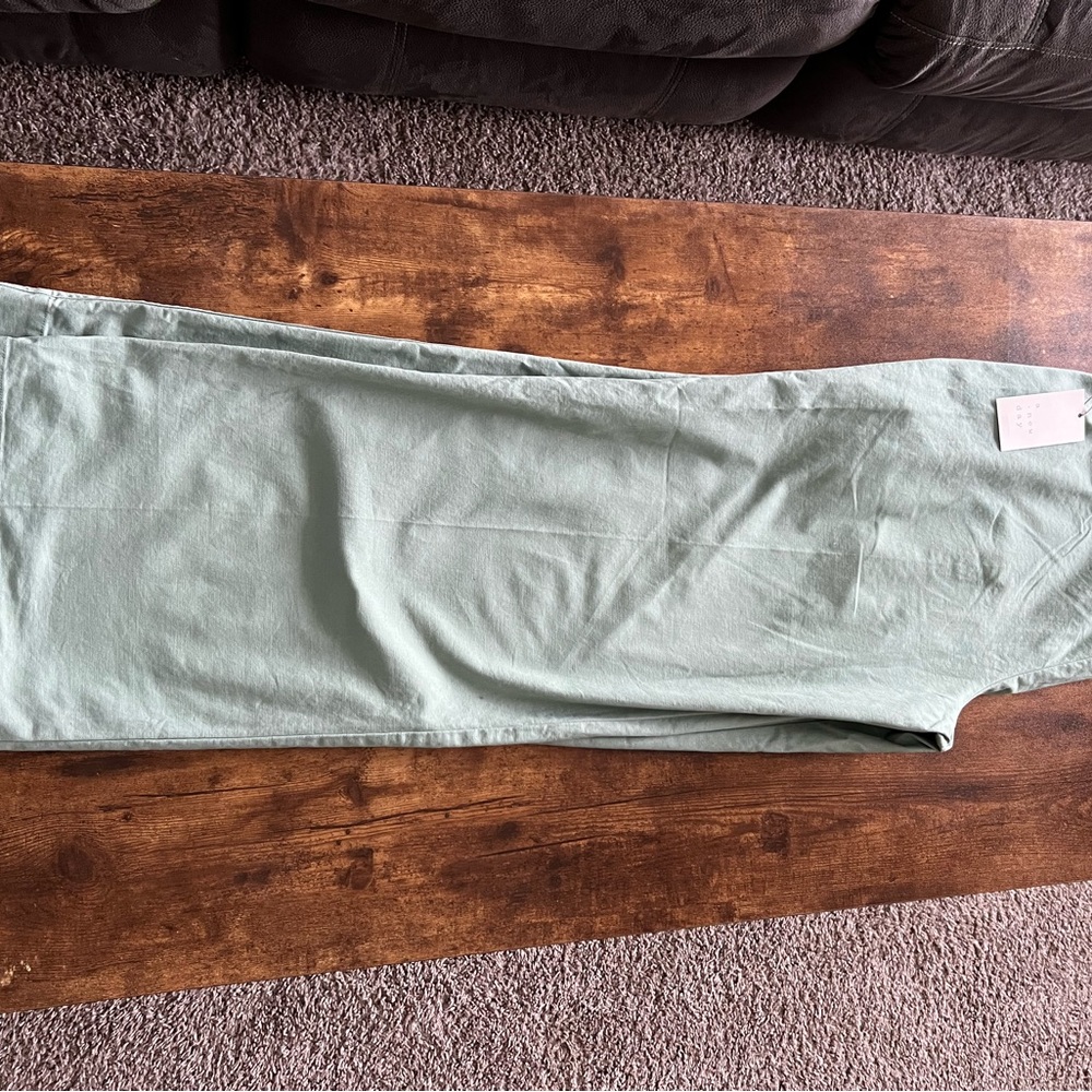 A new day light green pants size 8